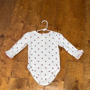 Janie and Jack super soft onesie with little red cherries and ruffled sleeves